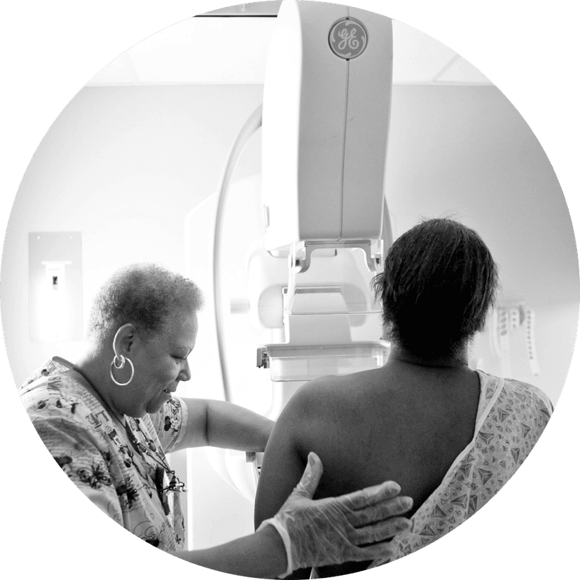 Healthcare provider assisting patient